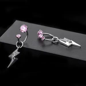 Detail of titanium alloy lightning bolt earrings with pink zircon and micro-pave stones.