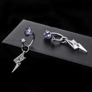 Macro detail of titanium alloy lightning bolt horseshoe rings featuring colorful zirconia