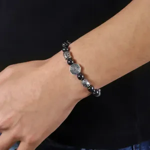 Imagen detallada de pulsera de cuentas para hombre con cabezas de Buda y dije Bagua.