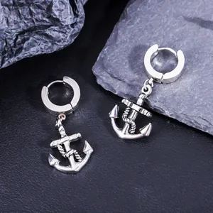 Detailed view of silver stainless steel anchor earrings with nautical rope design