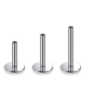 Detailed view of three F136 titanium labret posts in varying lengths with flat back.