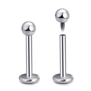 Detailed view of F136 titanium internally threaded labret stud with flat back design