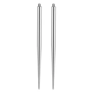 Close-up of stainless steel piercing insertion tapers with external threading.