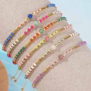 Bohemian handmade colorful seed bead bracelet set with gold spacers and stone accents