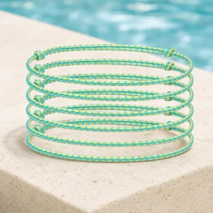 Set of six teal and yellow 8-strand braided cord bracelets in a casual stripe design.