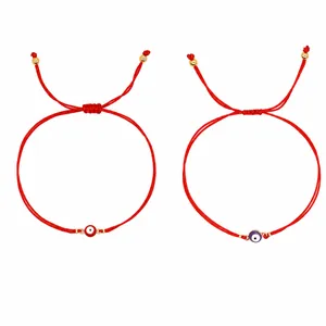 Handmade red braided cord bracelets featuring colorful evil eye protection charms