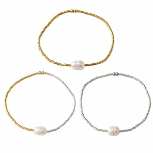 Elegant minimalist beaded bracelet set for women featuring white pearls in gold and silver
