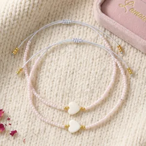 Ensemble de bracelets en perles élégants avec breloques cœur blanc et cordon réglable