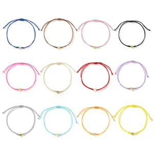 Set of 12 colorful adjustable braided heart bracelets with gold charms for daily wear