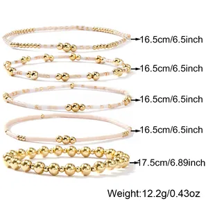 Stackable Bohemian gold copper bead bracelet set with white seed beads and sizes