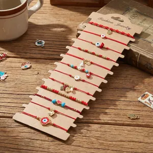 Multistyle adjustable red string woven bracelet set with Evil Eye and heart charms