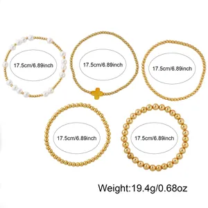 Set of five elegant gold beaded and pearl bracelets with clover charm and dimension info