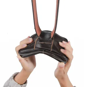 Flexible brown synthetic leather waist bag for men demonstrating soft texture