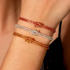 Set of three colorful seed bead bracelets with infinity knot design for beach style