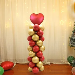 Elegant red and gold balloon column set with heart top for wedding and party decorations