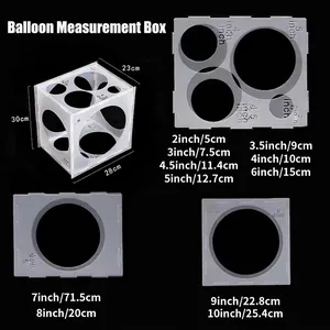 Caja medidora de globos con 11 agujeros y escalas en pulgadas y centímetros