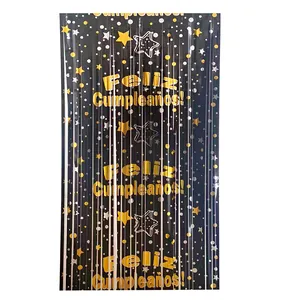 Black and gold Spanish Feliz Cumpleaños foil fringe curtain backdrop for birthday party