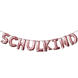 Rose gold SCHULKIND foil balloon banner for German school enrollment ceremony