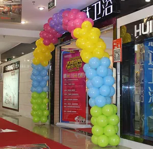 Multi-colored balloon arch decoration for mall grand opening and storefront celebration events