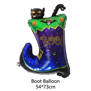 Halloween witch boot shaped foil balloon with 'BOO!' print and spooky patterns.