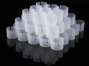 Close-up detail of white translucent plastic ring connectors for wedding arch pole frames