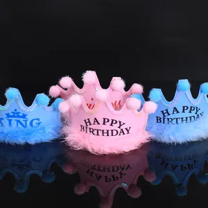 Variety of colorful birthday party crowns with soft pom-poms and fur trim details.