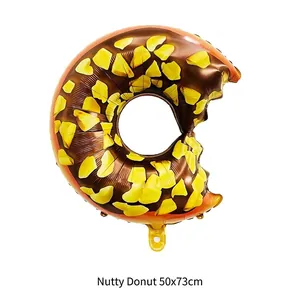 Brown and yellow nut-patterned donut foil balloon, bitten shape for party decoration