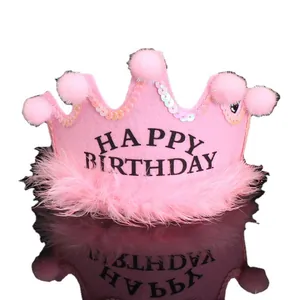 Pink felt birthday crown hat with pom-poms feathers and Happy Birthday text