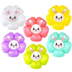Detailed view of colorful flower-shaped aluminum foil balloons with cartoon rabbit faces