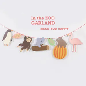 Detail showing various animal-themed cutouts on a festive party garland string line.
