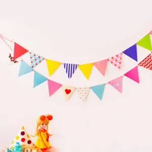 Decorative colorful triangular paper bunting banner for children's birthday party scene