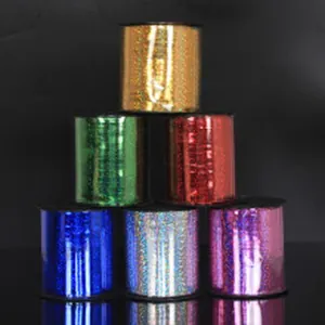 Detailed view of six colorful holographic ribbon rolls for wedding and DIY decor.