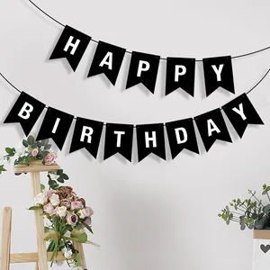 High-quality detailed shot of a black swallowtail Happy Birthday banner for party decor