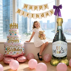 Large standing birthday balloon set featuring cake and champagne bottle designs for party decor.