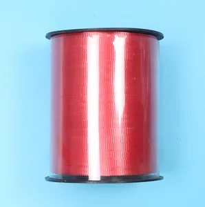 Bulk 500-yard roll of vibrant red decorative ribbon for balloons and DIY
