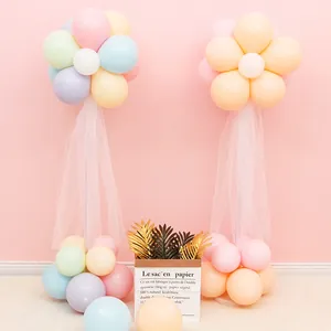 Elegant pastel macaron balloon column stand with white tulle for party events