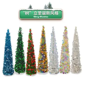 Collection of seven colorful folding tinsel Christmas trees for festive holiday party decoration