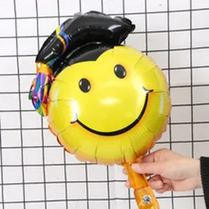 Graduation smiley face foil balloon with doctor cap for party