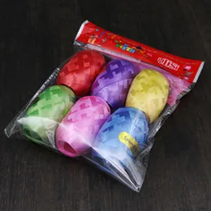 Set of six colorful curling ribbons for balloon decoration and gift wrapping in packaging