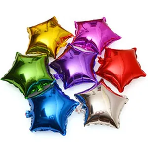 Close-up of multi-colored star-shaped foil balloons for festive party decoration