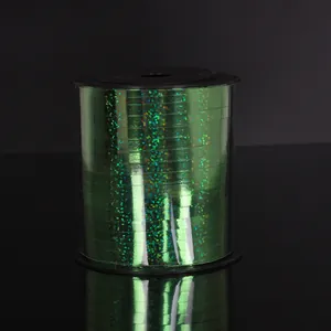 Close-up of 250 yards green holographic laser ribbon for wedding decorations and balloons.