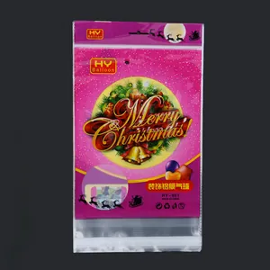 Detailed view of the pink decorative Merry Christmas foil balloon packaging bag.