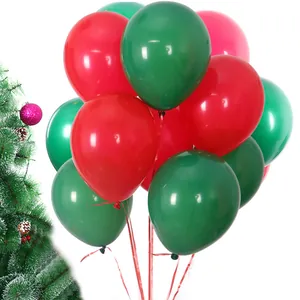 Close-up of festive red and green 2.2g matte latex balloons for Christmas party decoration.