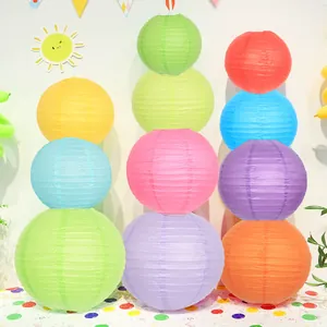 Set of colorful round paper lanterns in various sizes for festive party decoration
