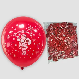 Detail of red Christmas latex balloon with Santa Claus and snowflake print in bulk