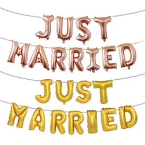 Detailed view of gold and rose gold Just Married letter foil balloon banner sets