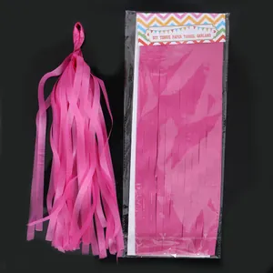 Detail view of pink 35cm DIY tissue paper tassel garland and its original packaging