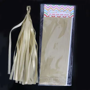 Champagne tissue paper tassel garland shown assembled and in original DIY packaging