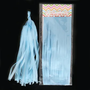 Detail view of 35cm light blue tissue paper tassel for DIY party garland decoration