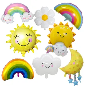 Colorful foil balloons set with smiling clouds and rainbow for baby birthday party